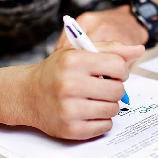 A military medical student takes a test. A military medical student takes a test.