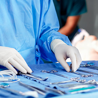 A military physician sets out tools. A military physician sets out tools.