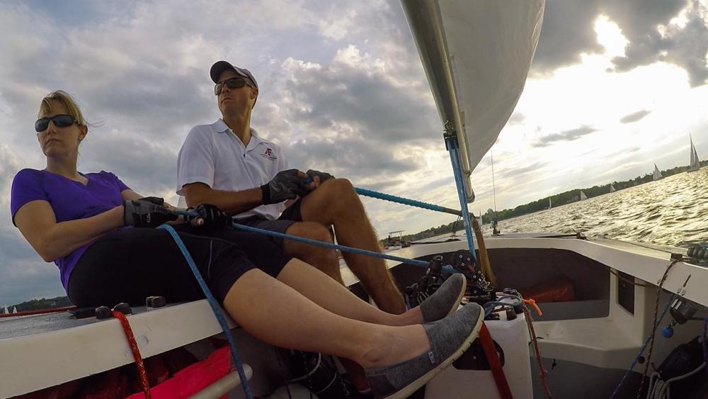 Dawn and Dr. Forsberg sitting on a sailboat 