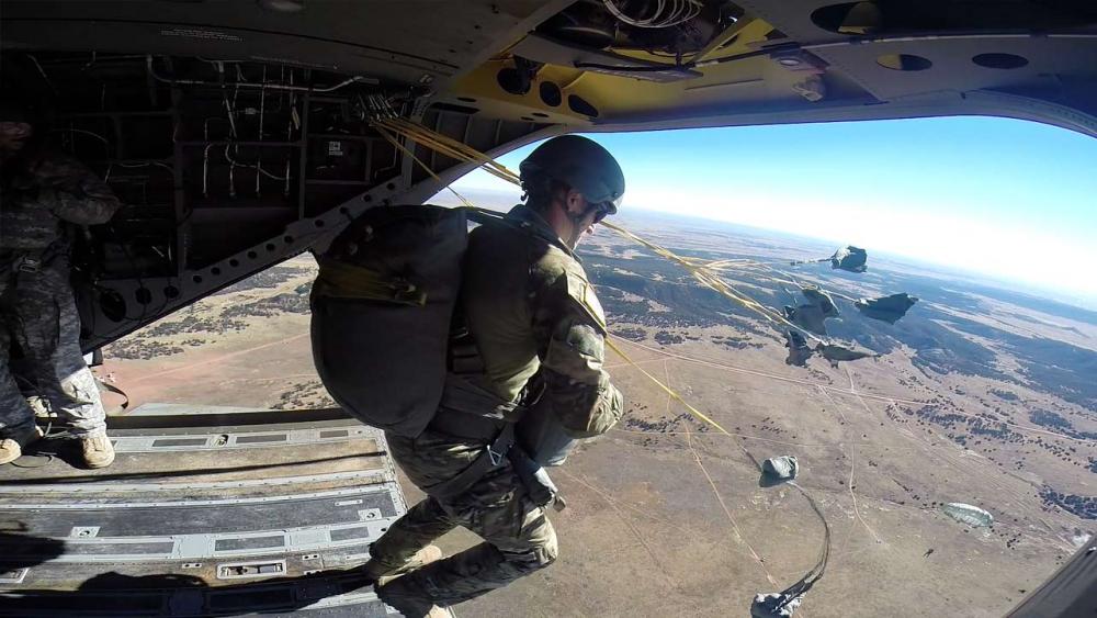 Hunter jumping out of helicopter 