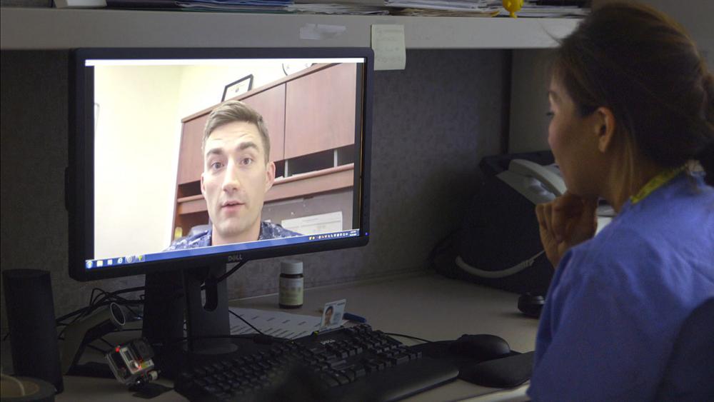 Josephine sees patient on computer screen 