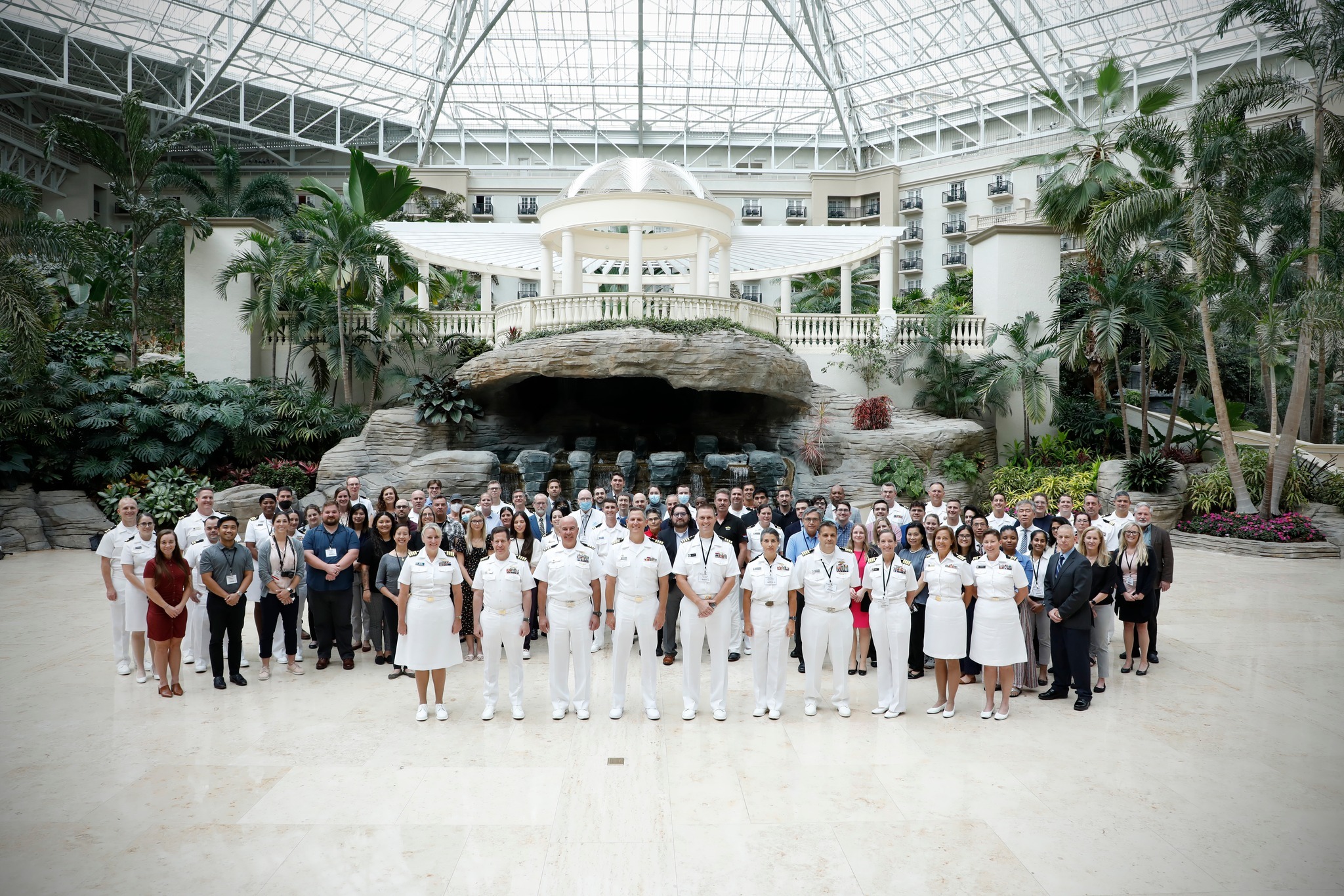  Military and civilian staff from the Naval Medical Research & Development (NMR&D) enterprise pose for a group photo at the 2023 Military Health System Research Symposium.
